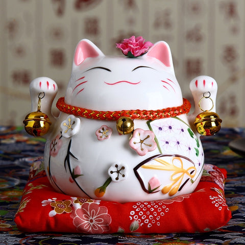 maneki-neko chat porte bonheur chinois ou japonais